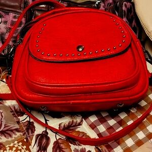 Multiple handbags, many brands, styles, sizes, colors and prices
